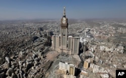 FILE - This Oct. 27, 2012 file aerial image made from a helicopter shows the Abraj Al-Bait Tower, also known as Makkah Royal Clock Tower Hotel