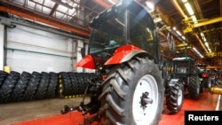 FILE - A general view shows the assembly line of the Minsk Tractor Works in Minsk, Belarus, May 29, 2016. 