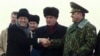 资料照片：美（左）、乌（中）、俄三国国防部长在基辅附近一处军事基地共同见证该地的一处核弹发射井被销毁。（1996年1月5日）