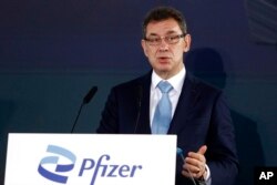 FILE - Pfizer CEO Albert Bourla speaks during a ceremony in Thessaloniki, Greece, Oct. 12, 2021.
