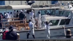 Gad Kòt ameriken mennen tounen ann Ayiti yon lòt gwoup ayisyen yo kenbe sou kòt Kiba. Gerard Maxineau