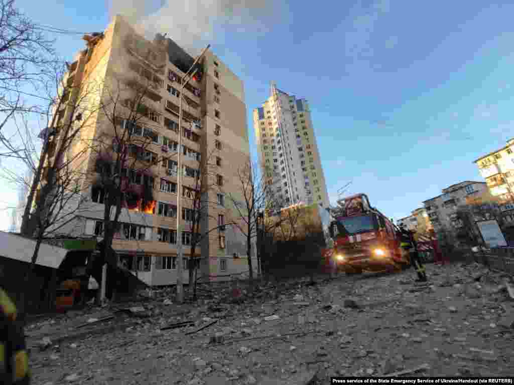 A view shows a residential building damaged by shelling in Kyiv in this handout picture released March 16, 2022.