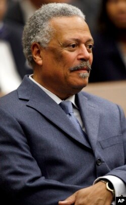 FILE - U.S. District Judge Emmet G. Sullivan is pictured during a ceremony at the federal courthouse in Washington, May 1, 2008.