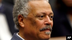FILE - U.S. District Judge Emmet G. Sullivan is pictured during a ceremony at the federal courthouse in Washington, May 1, 2008. 