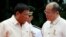 Incoming President Rodrigo Duterte (L) listens as outgoing President Benigno Aquino talks to him before Aquino leaves the Malacanang Palace in Manila, Philippines, June 30, 2016.