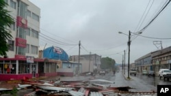 Debris lays strewn on a road in Nampula Province, Mozambique, March 12, 2022. 