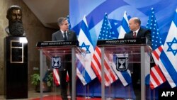 Israeli Prime Minister Naftali Bennett (R) and US Secretary of state Antony Blinken address the media following their meeting at the prime minister's office in Jerusalem, on March 27, 2022.