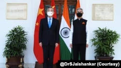 中國國務委員兼外交部長王毅3月25日在新德里會晤印度外長蘇杰生。