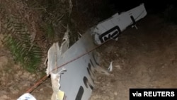 Plane debris is seen at the site where a China Eastern Airlines Boeing 737-800 plane flying from Kunming to Guangzhou crashed, in Wuzhou, Guangxi Zhuang Autonomous Region, China March 21, 2022.