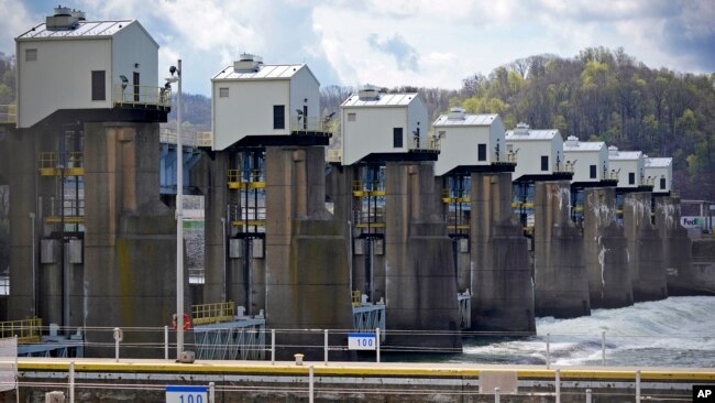 The Emsworth Dam and Lock are seen on the Ohio River in Emsworth, Pa., April 9, 2021. As the U.S. pushes to use more low-carbon energy, some hydropower companies see an opportunity to expand hydropower generation while minimizing environmental harm. (AP /Gene J. Puskar, File)