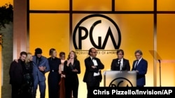 The Producing team and cast of "Coda" accept the Darryl F. Zanuck Award for Outstanding Producer of Theatrical Motion Pictures at the 33rd annual Producers Guild Awards at the Fairmont Century Plaza Hotel in Los Angeles, March 19, 2022. 