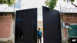 FILE - The gate of the Casa de los Saberes or House of Knowledge, dedicated to dignify indigenous women, in Guerrero state, Mexico, Oct. 1, 2021. 