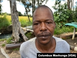 Mike Pfaranda says he is concerned about raw sewage spilling into the Mukuvisi River for years in the Harare suburb of Waterfalls on March 21, 2022. (Columbus Mavhunga/VOA)