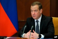 FILE - Russian Security Council Deputy Chairman Dmitri Medvedev speaks in Moscow, Russia, Feb. 22, 2022. (Sputnik via AP)