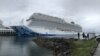 FILE - The Norwegian Bliss docked in Vancouver, British Columbia, on Sept. 30, 2018. Before the pandemic, Vancouver tourism officials estimated that each ship’s visit to the city generates at least $2.2 million in economic benefits. (Craig McCulloch/VOA)