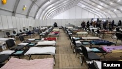 A general view of a humanitarian aid tent for people fleeing Ukraine, amid Russia's invasion, in Warsaw, Poland, March 22, 2022.