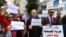 FILE - Tunisian journalists rally for press freedom, outside the SNJT national journalists' union in Tunis, on March 25, 2022. Journalists gathered on May 18, 2023, to protest anti-terror laws they say are being used against them.