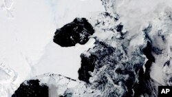 This satellite image provided by NASA, Terra MODIS 22 on February 2022 shows The Conger/Glenzer (Bowman Island) ice shelf and associated fast ice pre-collapse. 