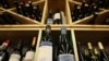 FILE - Bottles of South African wine are displayed among others at a supermarket in Beijing, China, Feb. 4, 2021. 