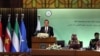 Chinese Foreign Minister Wang Yi speaks at the start of a two-day gathering of the 57-member Organization of Islamic Cooperation, at the Parliament House in Islamabad, Pakistan, March 22, 2022. 