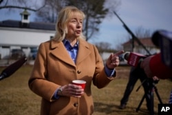 FILE - Gov. Janet Mills attends an event at the Blaine House, Friday, March 11, 2022, in Augusta, Maine.