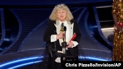 Jenny Beavan accepts the award for best costume design for "Cruella" at the Oscars on Sunday, March 27, 2022, at the Dolby Theatre in Los Angeles.
