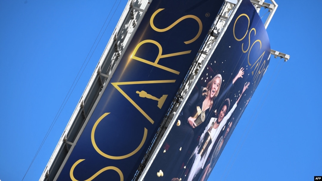 A sign announcing the upcoming Oscars Award show towers over Hollywood Boulevard, in Hollywood, California March 18, 2022. The 94th Academy Awards will take place on March 27, 2022.