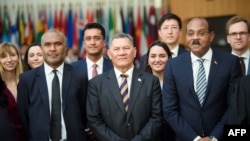 Gaston Browne (R-L), Prime Minister of Antigua and Barbuda, Arnold Loughman, Attorney General of Vanuatu, and Kausea Natano, Prime Minister of Tuvalu, pose for a picture during a hearing at the International Tribunal for the Law of the Seas on Sep 11, 2023 in Hamburg, Germany.