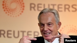 FILE - Former British Prime Minister Tony Blair speaks during an interview at a Reuters Newsmaker event in London, Nov. 25, 2019.