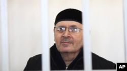 Oyub Titiyev, the head of regional branch of Russian human rights group Memorial, attends a court hearing in Grozny, Russia, March 6, 2018. A court in Chechnya extended his detention of Oyub Titiyev until May 9. And Friday, he lost an appeal of that decision.