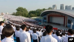 North Korean students gather for a rally to denounce South Korea following that defectors and other activists in South Korea flew anti-Pyongyang leaflets over the border, at the Pyongyang Youth Park Open-air Theatre in Pyongyang, Saturday, June 6,…