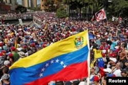 Opozicione pristalice na mitingu protiv venecuelanskog predsjednika Nicolasa Madura, u Karakasu, Venecuela, 23. januara 2019.