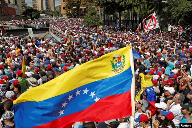 Opposition supporters take part in a rally against Venezuelan President Nicolas Maduro's government in Caracas, Venezuela, Jan. 23, 2019.