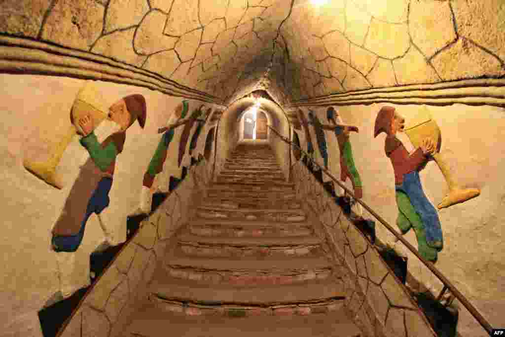 The sandstone cellar walls are painted with images of mermaids, dwarfs and Alpine landscapes. The painter was a local citizen Maxmillian Appeltauer (1904-1972), who devoted his free time to the art, in the village Satov, Czech Republic.