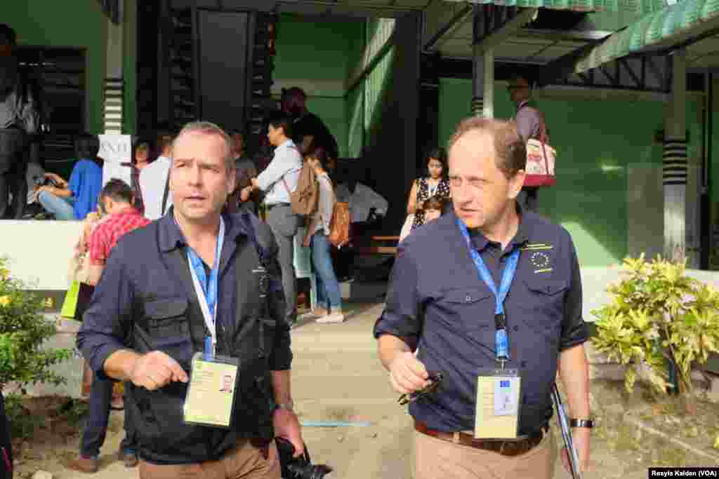 Election observers from the European Union at a polling station in Yangon, Nov. 8, 2015.