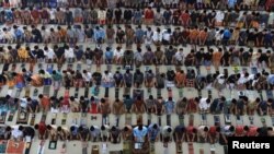 FILE - Students pray at Ar-Raudhatul Hasanah Islamic boarding school on the first day of Ramadan in Medan, North Sumatra, Indonesia June 6, 2016. 