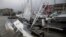 A boat is damaged by Hurricane Sally in Pensacola, Florida, Sept. 16, 2020. 
