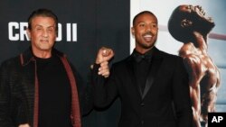 Sylvester Stallone, left, and Michael B. Jordan attend the world premiere of "Creed II" at the AMC Loews Lincoln Square in New York, Nov. 14, 2018.