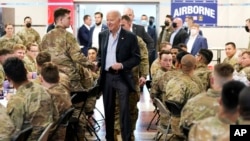 President Joe Biden visits with members of the 82nd Airborne Division March 25, 2022, in Jasionka, Poland.