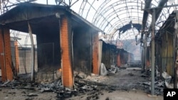 The city market is seen damaged by night shelling in Chernihiv, Ukraine, March 30, 2022.