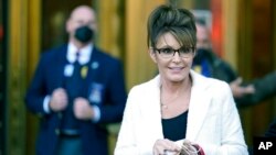 FILE -Sarah Palin leaves a courthouse in New York, Feb. 10, 2022.