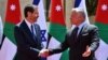 Israeli President Isaac Herzog, left, shakes hands with Jordan's King Abdullah II during a diplomatic visit to Amman, Jordan, March 30, 2022. 