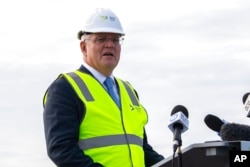 Australian Prime Minister Scott Morrison visits a new airport site in Sydney, March 28, 2022.