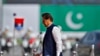 Pakistan's Prime Minister Imran Khan arrives to attend a military parade to mark Pakistan National Day in Islamabad, Pakistan, March 23, 2022. 