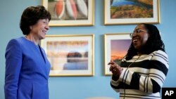 FILE - Supreme Court nominee Ketanji Brown Jackson meets with Sen. Susan Collins, on Capitol Hill in Washington, March 8, 2022.