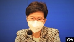 香港特首林鄭月娥表示，4月21日大部份防疫措施可以分3個月、3階段逐步解除，但是限聚令及口罩令仍然會持續一段日子。(美國之音 湯惠芸)
