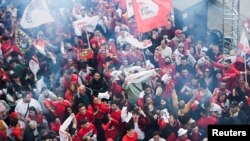 Malta's Labour Party supporters celebrate the general election win outside the party's headquarters in Hamrun, Malta, March 27, 2022.