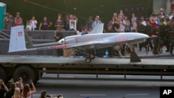 FILE - A Turkish-made Bayraktar drone is seen during a rehearsal of a military parade dedicated to Independence Day in Kyiv, Ukraine, Aug. 20, 2021.