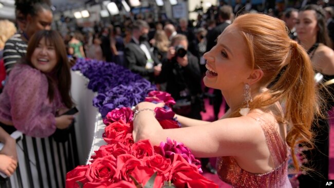 Jessica Chastain, who is nominated for a Best Actress award arrives at the Oscars on Sunday, March 27, 2022, at the Dolby Theatre in Los Angeles. (AP Photo/John Locher)