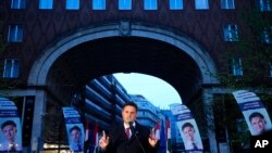 Peter Marki-Zay, leader of United For Hungary, the six-party opposition coalition, speaks during the final rally in Budapest, Hungary, April 2, 2022, ahead of Sunday's election. Hungary's nationalist prime minister seeks a fourth straight term.